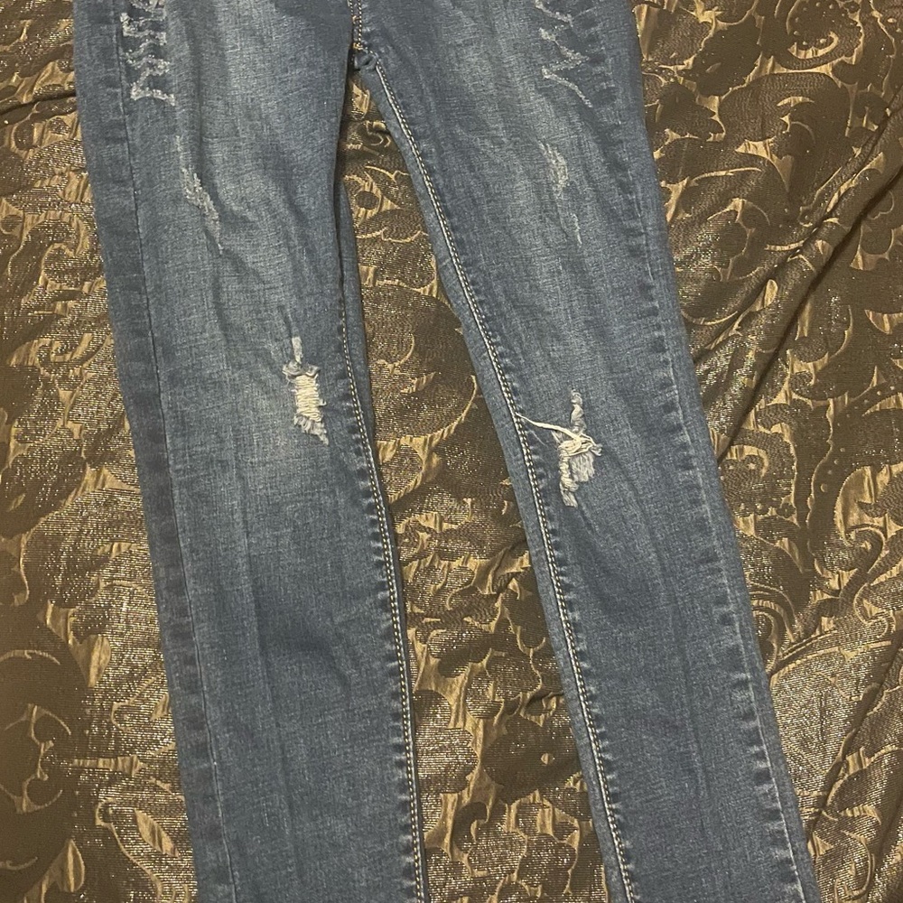 Distressed Blue Jeans